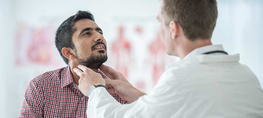 doctor-checking-for-thyroid-nodules-OC-ENT-Clinic