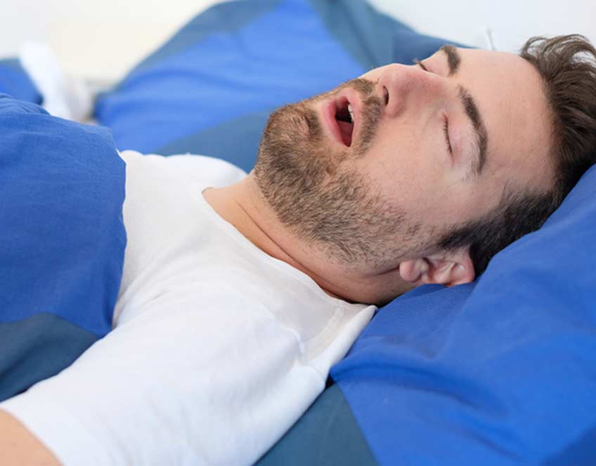 patient-needing-snoring-treatments-OC-ENT-Clinic